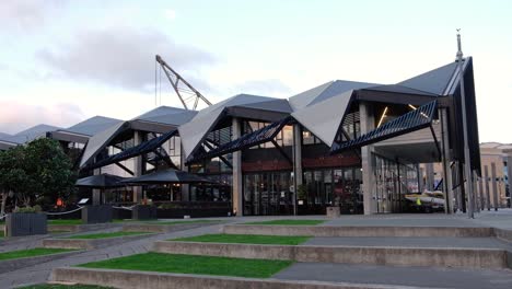 Architecturally-designed-Maori-Te-Wharewaka-boat-house-building-in-capital-Wellington,-New-Zealand-Aotearoa