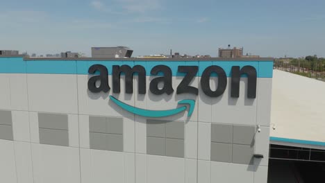 Aerial-View-of-Amazon-Smile-Logo-on-Fulfillment-Center-Warehouse