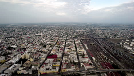 lateral-drone-shot-of-the-arrival-of-merchandise-by-rail-at-the-port-of-veracruz-in-mexico