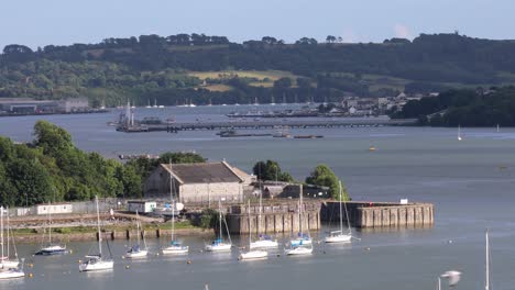 The-River-Tamar-Between-Devon-and-Cornwall-on-a-Summers-Day-with-Yachts-and-the-Town-of-Torpoint-in-the-Distance