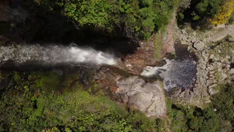Aerial-overhead-shot-of-the-mouth-of-the-waterfall-known-as-Cascada-del-Vino,-located-in-the-state-of-Lara