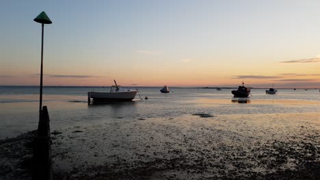Time-lapse-time-of-the-sea-going-out-at-sunset-out-at-Southend-Estuary-in-Essex