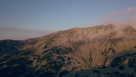 Wide-shot-of-aerial-drone-view-of-Retezat-Mountains,-Romania