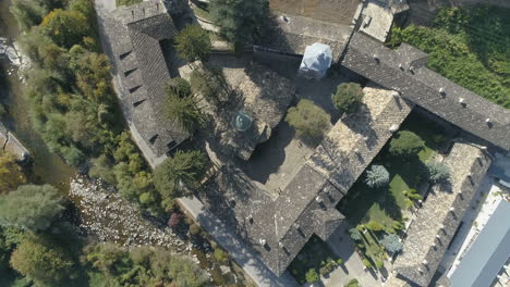 View-over-the-rooftops-of-the-Troyan-Monastery-in-Bulgaria,-aerial-footage