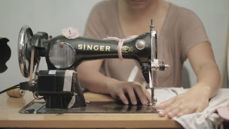 Seamstress-Working-On-A-Sewing-Machine