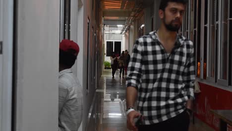 A-timelapse-of-college-students-moving-in-the-corridor-of-their-college