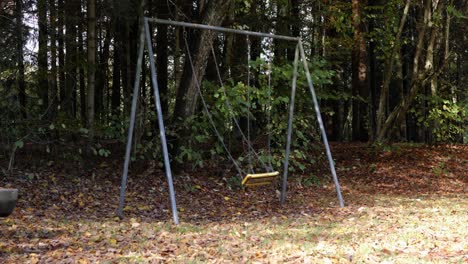 Creepy-scene-of-swing-set-moving-with-nobody-on-it