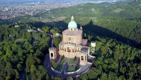 Sanctuary-of-the-Blessed-Virgin-of-Saint-Luke-in-Bologna-Italy-during-sundown,-Aerial-orbit-reveal-shot