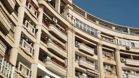 Bucharest,-Romania---Novrmber:-Astonishing-design-of-a-block,-with-huge-balconies,-windows-and-patchwork-with-flowers
