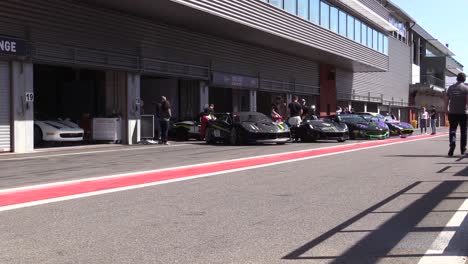 Supercars-prepeare-in-the-pit-lane-at-Circuit-De-Spa-Francorchamps-in-pre-race-practice---Timelapse