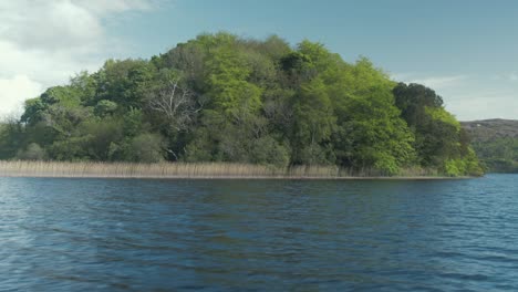Stunning-island-scenery-Ireland-lake-wilderness-nature-tracking-shot