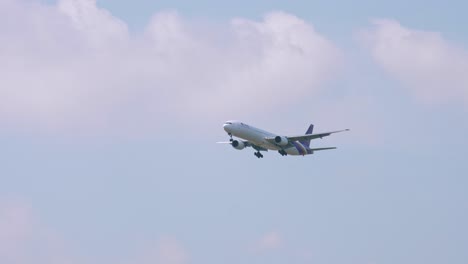 Thai-Airways-Boeing-777-3D7-HS-TKA-approaching-before-landing-to-Suvarnabhumi-airport-in-Bangkok-at-Thailand