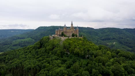 Aerial-View-of-Ancient-Burg-Hohenzollern-in-South-Germany-on-Hilltop