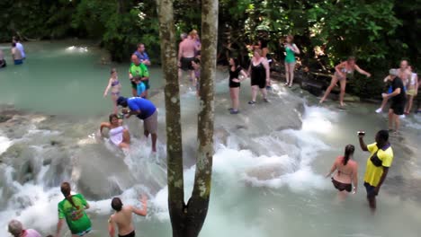JAMAICA---FEBRUARY-2012:-Tourists-enjoy-Dunns-River-Falls