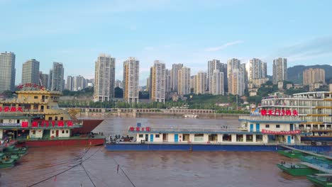 Luxury-passengers-cruise-ships-ready-to-depart-from-Chongqing-wharf-on-a-trip-through-the-Three-gorges-on-the-Yangtze-river-in-summer