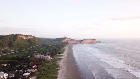The-Beautiful-and-Expensive-Island-Resort-In-Olon-Beach,-Ecuador-Composed-Calm-Sea-and-Different-Buildings---Aerial-Shot