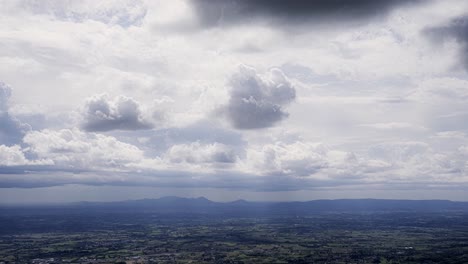 Time-lapse-of-dramatic-clouds-over-the-landscape-of-Pianura-Padana,-Veneto-Italy
