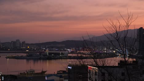 Beautiful-sunset-over-Sokcho-city-in-South-Korea-with-shipping-port