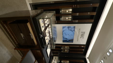 Vertical-Shot---Lavish-And-Refined-Interior-Of-IWC-Schaffhausen-Boutique-Showcasing-Brand's-Luxury-Timepieces-At-Shopping-Mall