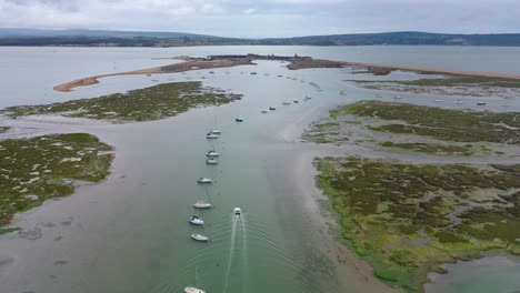 Aerial-view-overlooking-Hurst-Castle-and-a-river-in-the-UK-on-an-overcast-day