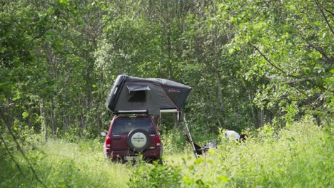 Camping-Car-With-Rooftop-Tent-In-The-Forest-In-Summer