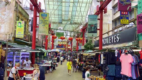 Kuala-Lumpur,-Malaysia:-High-angle-shot-over-roadside-stalls-in-street-market-in-Kuala-Lumpur,-Malaysia-at-daytime