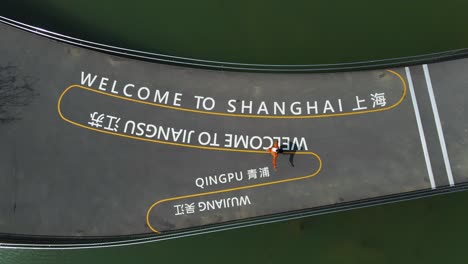 Welcome-to-Shanghai-Greeting-in-China---Aerial-Top-Down-Drone-View