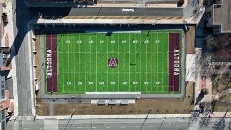 Descending-aerial-shot-of-Altoona-High-School-football-field