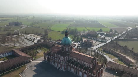 Aerial-shot-of-Santa-Maria-del-Fonte-Sanctuary-approaching-its-dome-in-the-town-of-Caravaggio-in-Lombardy-Region-|-Italy
