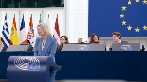 President-of-the-European-Parliament-Roberta-Metsola-talking-with-colleague-while-member-speeching-in-the-plenary-session-of-the-European-Parliament-in-Strasbourg,-France