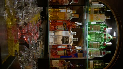 Vertical-Shot-Of-Irish-Pub-Colorful-Alcohol-Drinks-And-Glasses