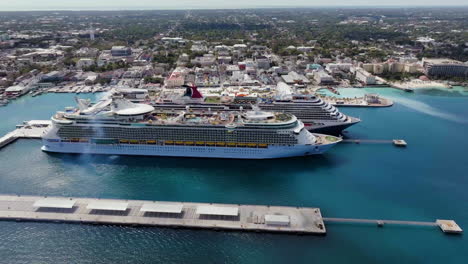 Aerial-view-around-voyagers-at-the-Cruise-Port,-Nassau-in-Bahamas---orbit,-drone-shot