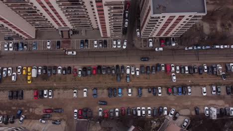 Aerial-View-Of-Cars-Parked-To-Close-To-Railway-Track