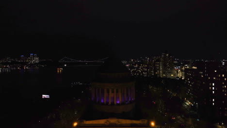 Aerial-view-over-the-Grant´s-tomb,-towards-the-George-Washington-Bridge,-night-in-NY,-USA