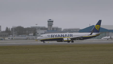 RYANAIR-plane-departing-runway-tarmac-from-Lech-Walesa-airport-in-Gdansk,-Poland