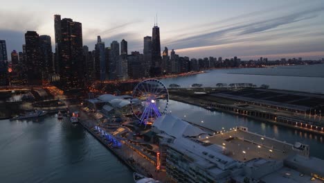 Centennial-Wheel-and-the-Navy-Pier,-sundown-in-Chicago,-USA---orbit,-drone-shot