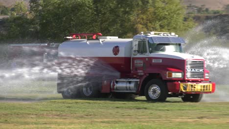 Truck-Spraying-water-to-keep-grass-alive