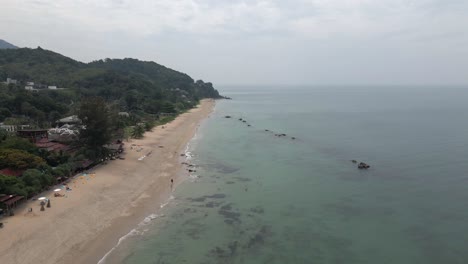 Quiet-grey-tourism-day-Koh-Lanta-sandy-beach-in-Thailand,-aerial-view