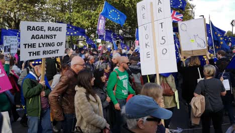 Mass-parade-and-demonstration-of-people-standing-up-to-the-european-parliament-in-london-city-in-england