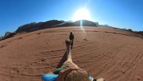 pov-riding-a-camel-in-the-desert