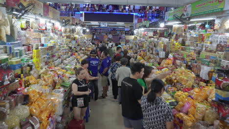 Brightly-lit-Han-market-vendors-display-products-and-food-to-market-shoppers