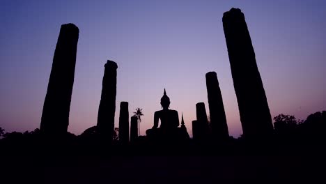 Dramatic-silhouettes-background-a-post-and-buddha-during-sunset