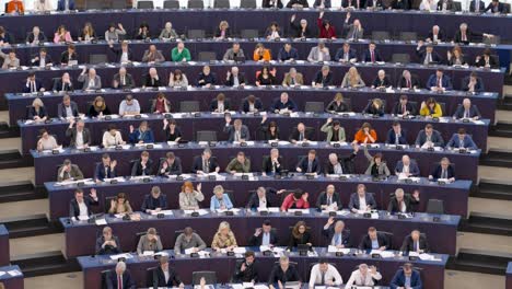 Members-of-the-European-Parliament-voting-during-the-EU-plenary-session-in-Strasbourg,-France---Medium-static-shot