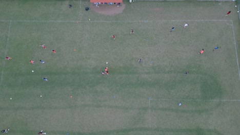 Rising-Overhead-Drone-Shot-of-Girls-Soccer-Practice