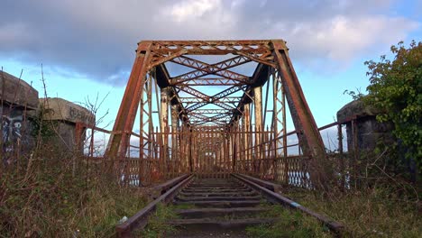 Waterford-The-Red-Iron-Bridge,-old-railway-bridge-on-closed-railway-line-that-crosses-The-River-Suir