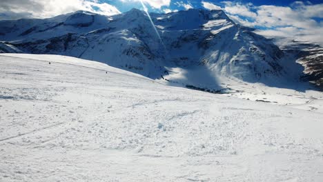 POV-Person-skiing-down-a-slope-in-the-alps