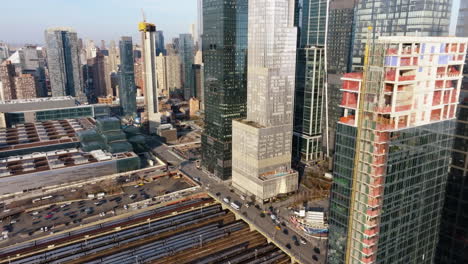 Aerial-view-over-the-West-Side-Yard-and-the-11th-ave-in-Hudson-Yards,-sunset-in-NY,-USA