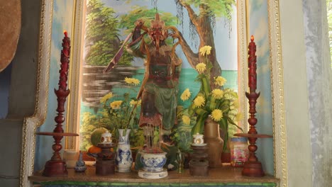 Hindu-altar-with-a-deity-resembling-a-devil,-recorded-in-Vietnam