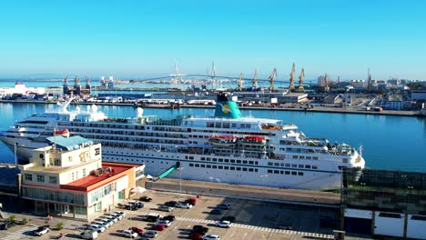 Big-cruise-ship-anchored-at-the-Cadiz-port-in-Southern-Spain-aerial-view
