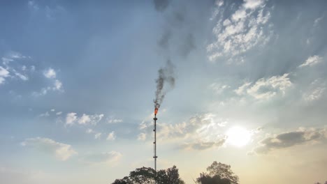 Establisher-wide-view-of-single-burning-Flare-stack-flame-releasing-Co2